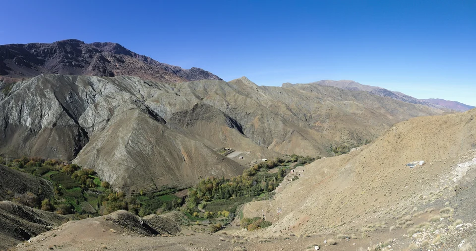 Mountain valley with terraced fields and bare slopes in the High Atlas near the Tizi n’Tichka pass, Morocco