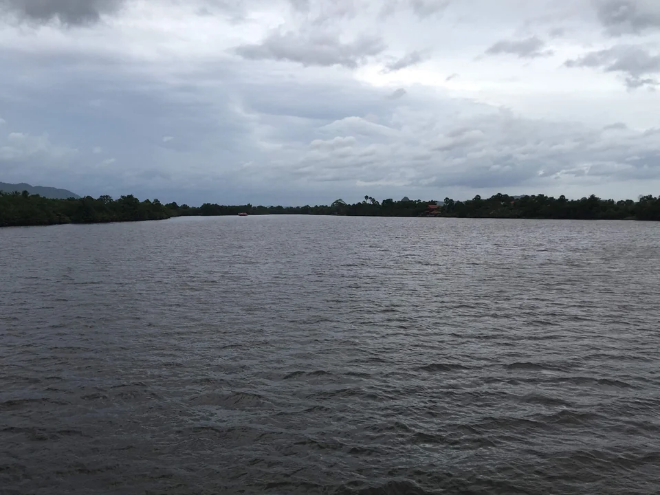 Quiet stretch of the Praek Tuek Chhu river in Kampot, southern Cambodia