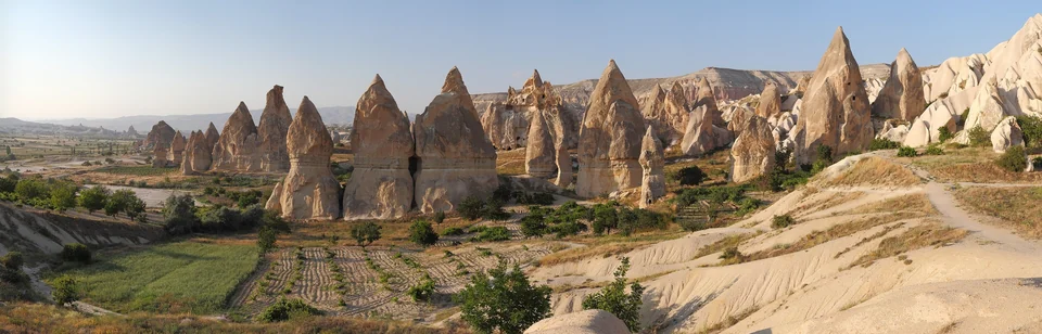 Wide panorama of fairy chimney rock formations and cave dwellings near Göreme in Cappadocia