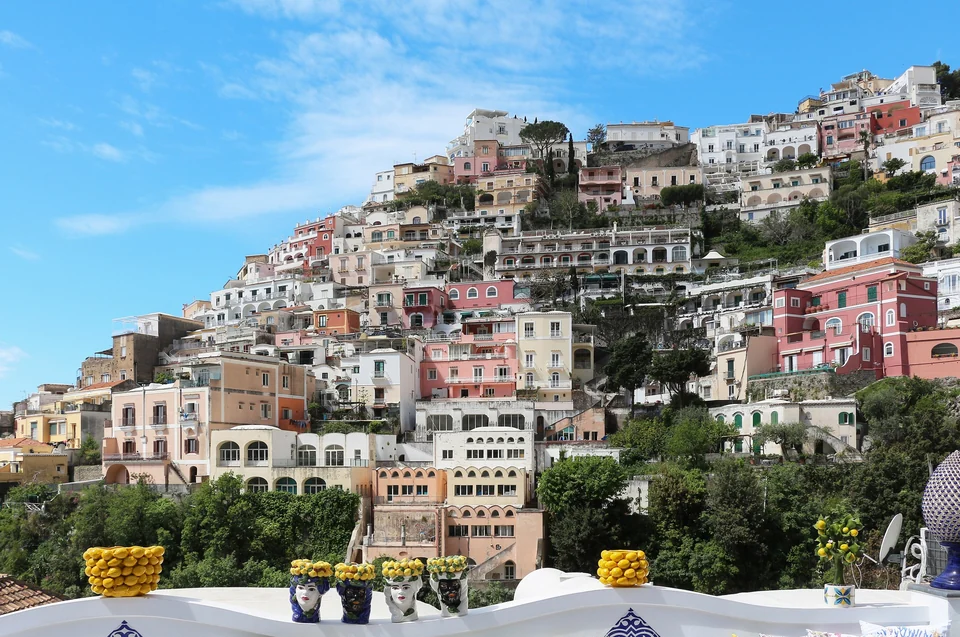 Colorful houses of Positano stacked up a steep hillside on the Amalfi Coast in southern Italy