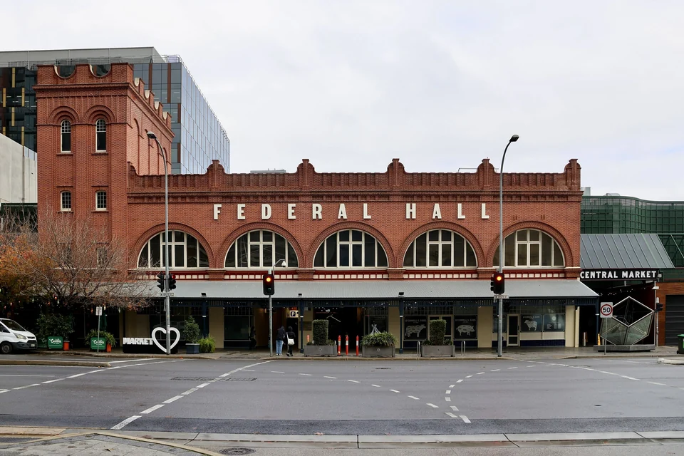 Red-brick Federal Hall facade at the entrance to Adelaide Central Market on Grote Street
