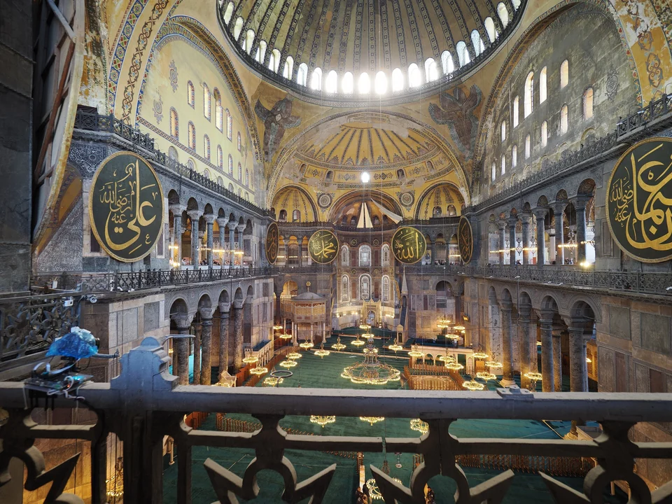 Interior of Hagia Sophia seen from the upper gallery, with the central dome, arches and Ottoman calligraphy roundels