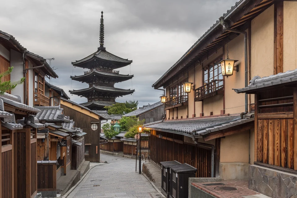 Yasaka-dori lane with stone paving, street lanterns and the five-story Yasaka pagoda in Higashiyama, Kyoto