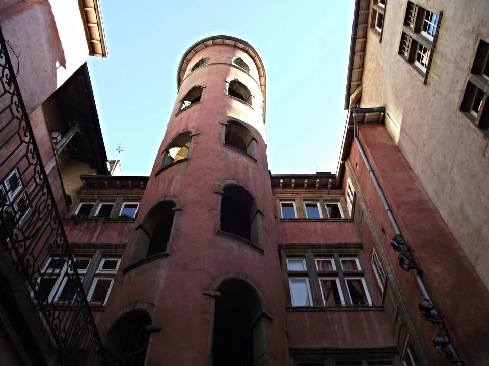 Pink Renaissance stair tower of the Tour Rose rising above a courtyard off Rue du Bœuf in Vieux Lyon