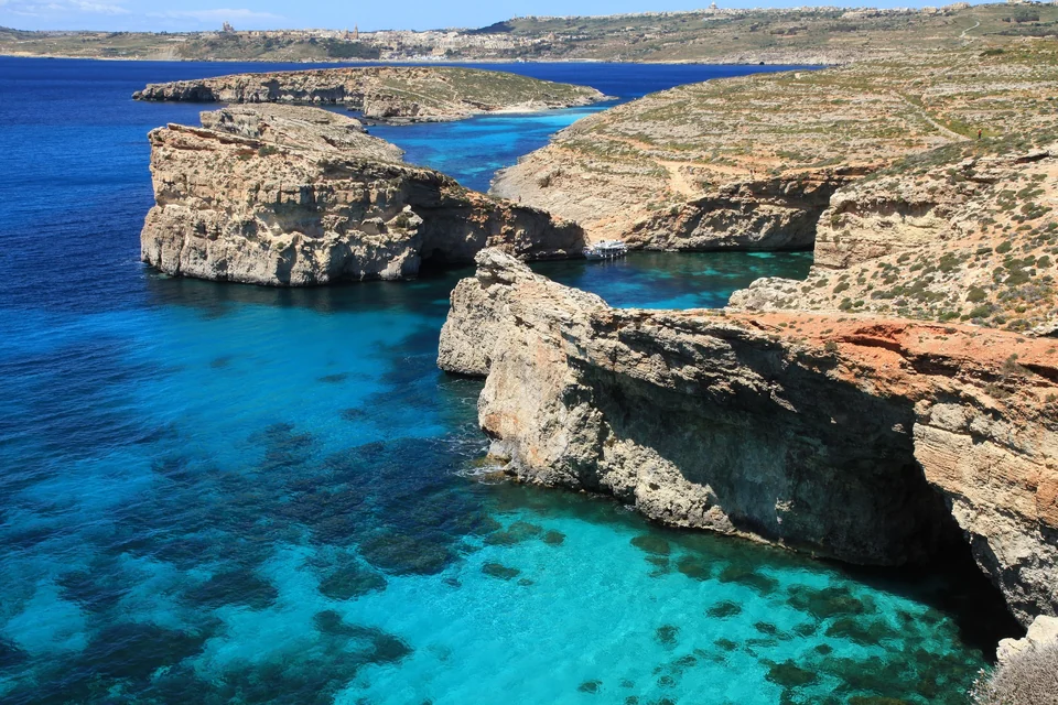 Turquoise water of the Blue Lagoon between Comino and the islet of Cominotto, Malta