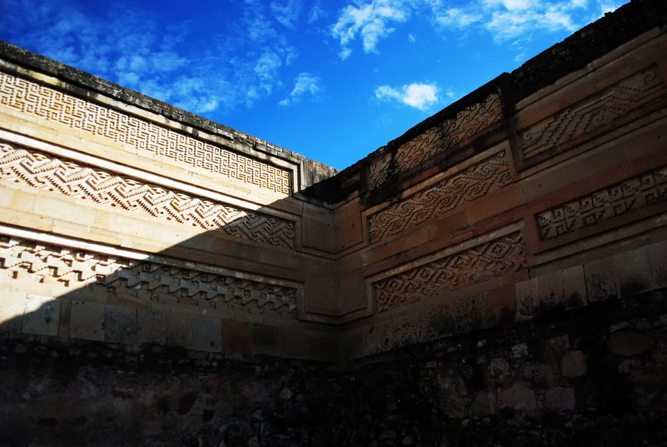 Geometric stone fretwork on a wall at the Mitla archaeological site in Oaxaca