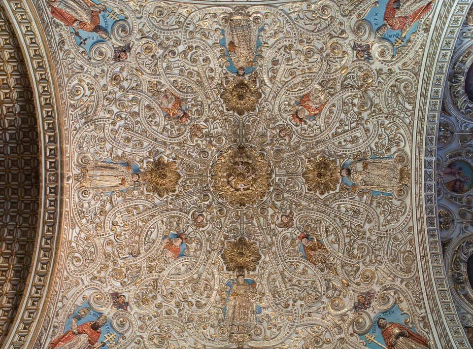 Baroque stone facade of the Church of Santo Domingo de Guzmán in Oaxaca City, Mexico