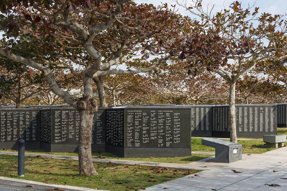Rows of black granite memorial walls of the Cornerstone of Peace at the Okinawa Peace Memorial Park in Itoman