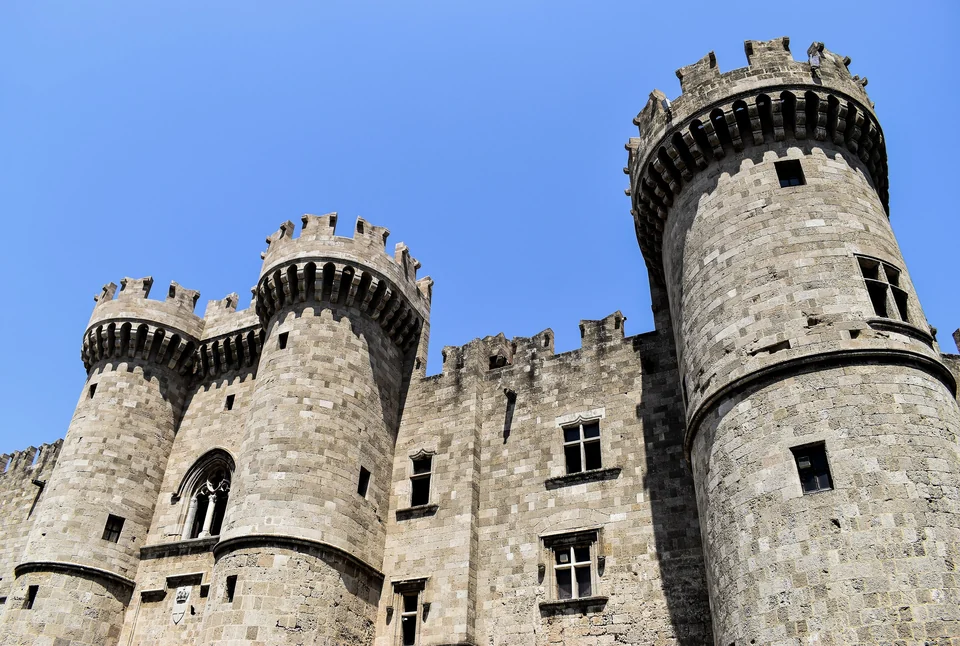 Stone facade and towers of the Palace of the Grand Master of the Knights of Rhodes in the Old Town