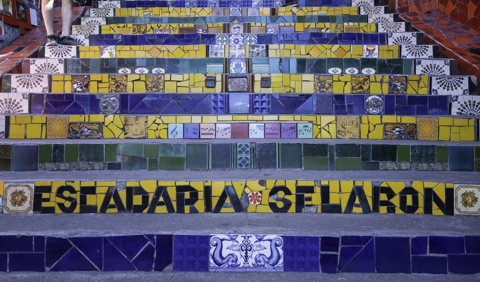 Brightly tiled Escadaria Selarón steps with mosaics in red, yellow, green and blue in Rio de Janeiro