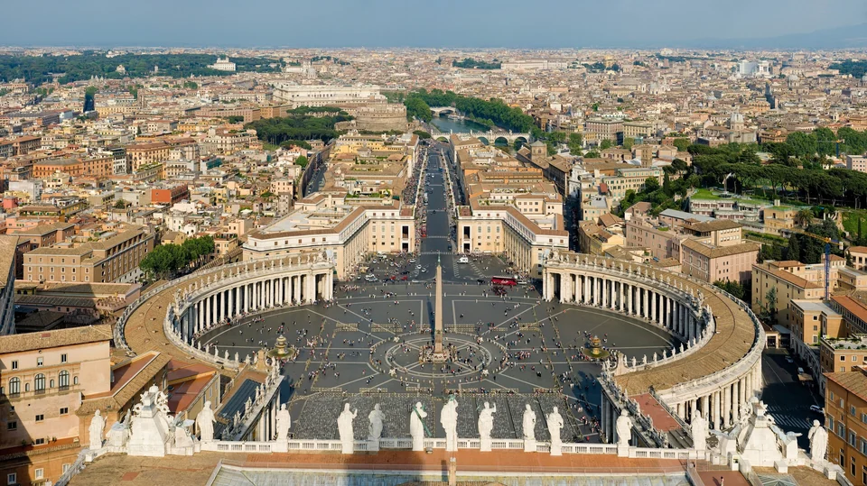 St Peter's Basilica and the curved colonnades of St Peter's Square in Vatican City
