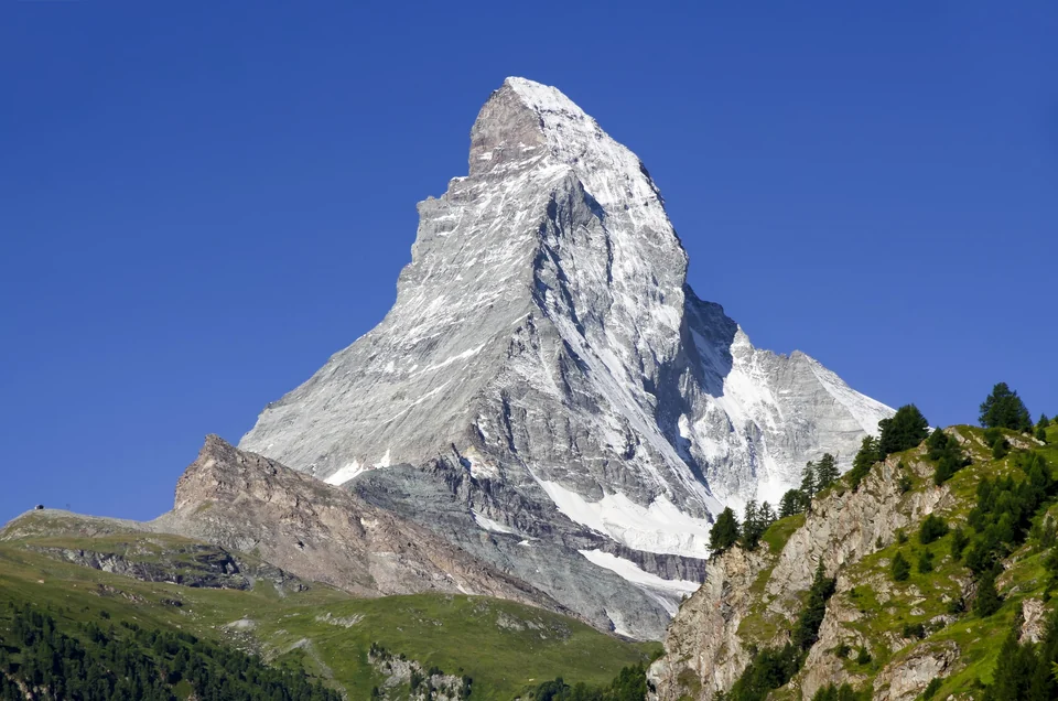 The Matterhorn rising above the village of Zermatt in the Valais Alps on a clear summer day