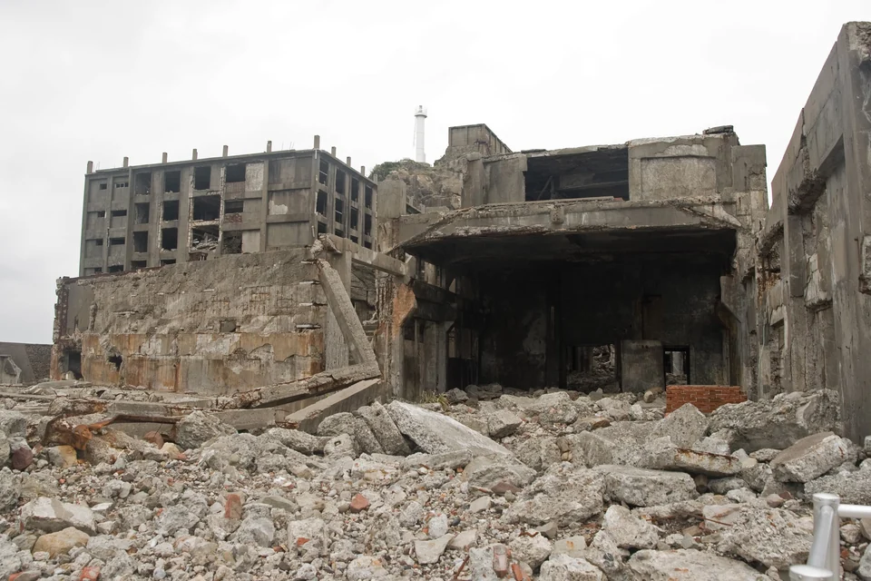 Collapsed concrete mine structures and broken rubble on the southern end of Gunkanjima