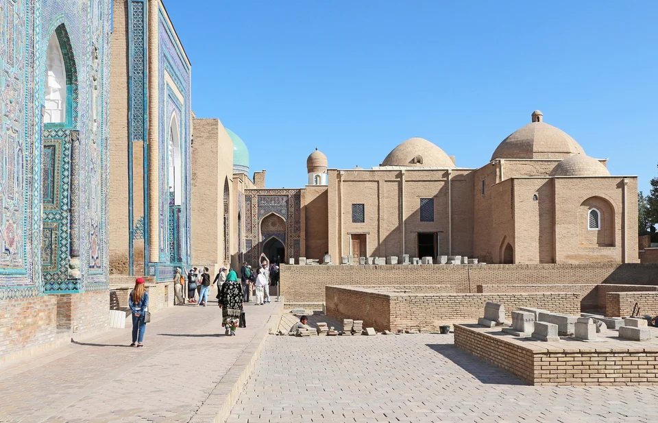 Tiled mausoleum facades and domed tombs along the stepped lane of the Shah-i-Zinda necropolis in Samarkand
