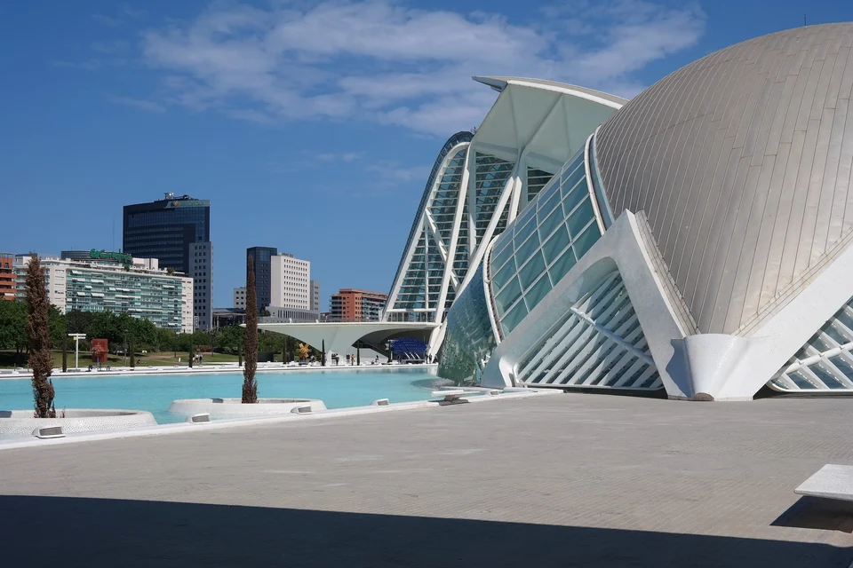 White Calatrava buildings and a turquoise pool at the City of Arts and Sciences in Valencia, Spain