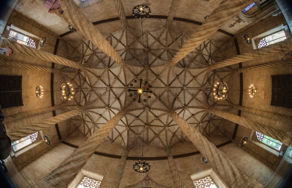 Twisted stone columns and vaulted ceiling in the Columns Hall of the Lonja de la Seda in Valencia