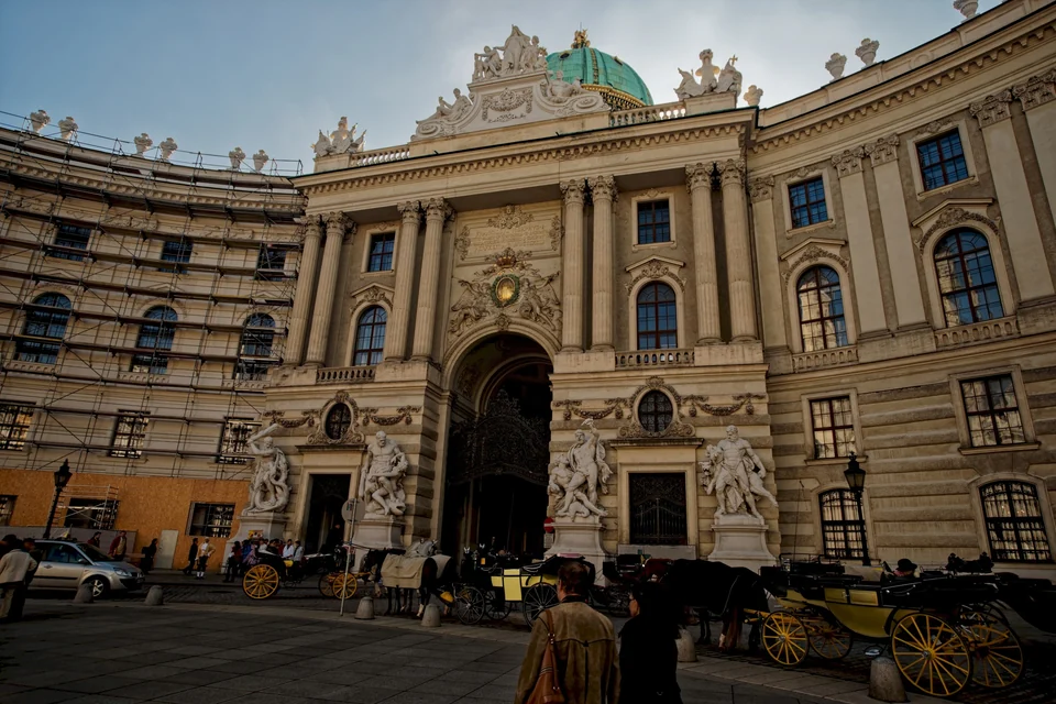 The domed Michaelertrakt entrance of the Hofburg on Michaelerplatz in Vienna