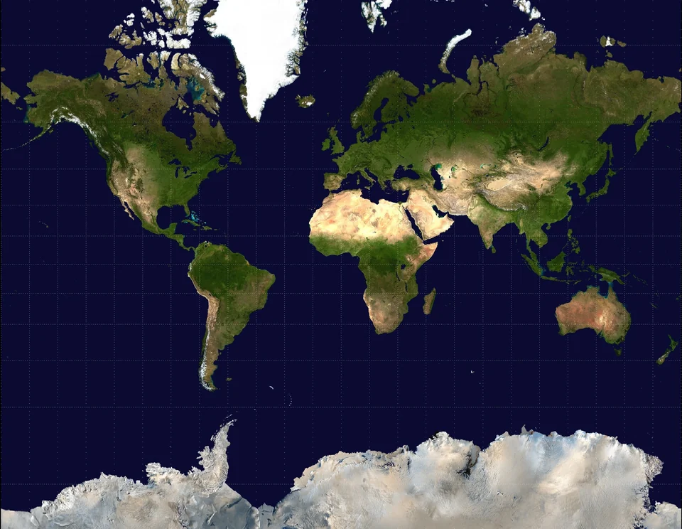 Satellite-image world map on the Mercator projection with an oversized Greenland and Antarctica stretched along the bottom