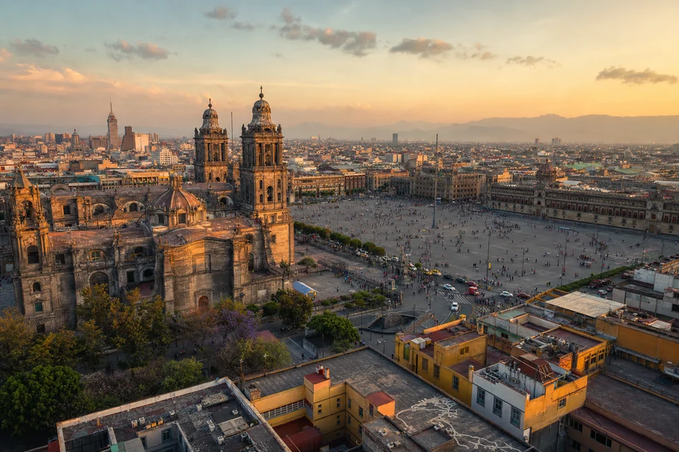 Panoramic view of the Metropolitan Cathedral and Zocalo in Mexico City at golden hour